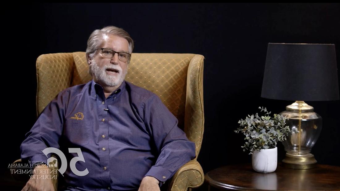 Dr. Frank McArthur sitting in chair